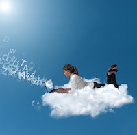 Businesswoman over a cloud